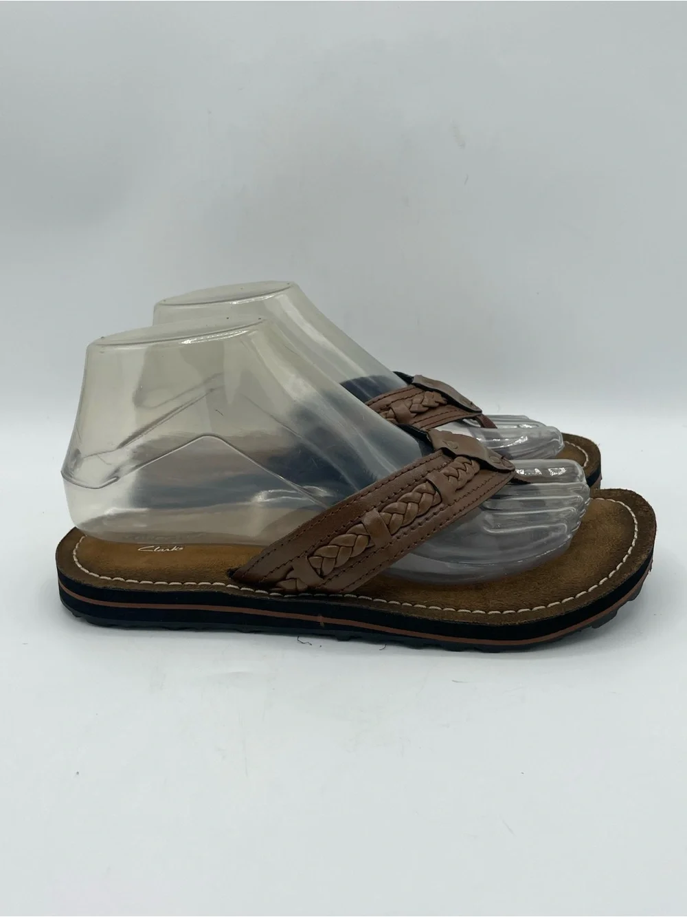 Clarks Collection Women’s Brown Braided Leather Toe-Post Sandals.
